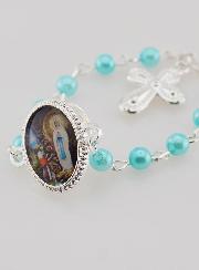 Pin's Dizainier Perle Bleue